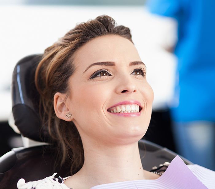 Woman in dental chair at Sunnyvale periodontal office